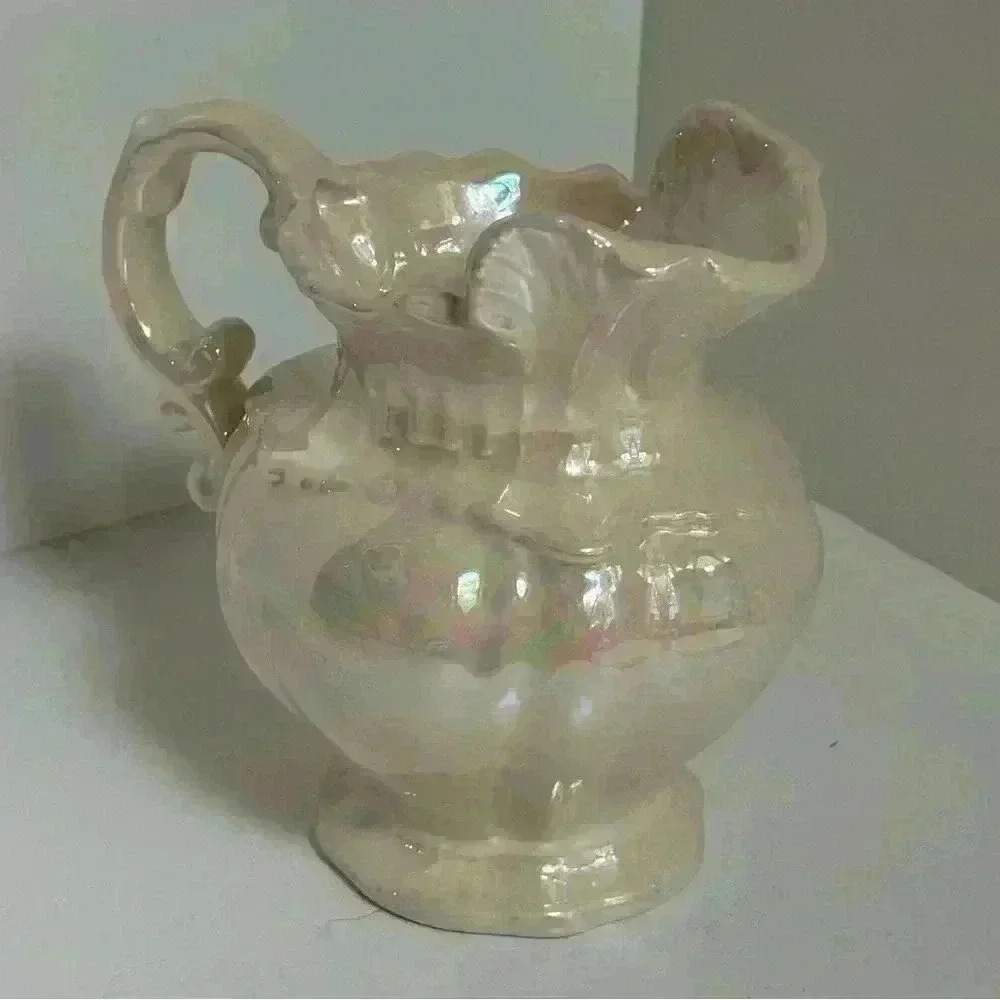 Vintage 1975 Arnels small ceramic irridescent ornamental  pitcher